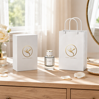 Flacon de parfum en verre rond rechargeable de haute qualité, boîte cadeau en forme de livre au design personnalisé pour l'emballage de marques de parfum