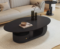 Table basse créative de style crème, ovale, pour petit appartement, style italien minimaliste, plateau en roche, table à thé