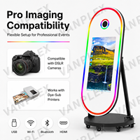 Machine de photomaton ovale 60 pouces avec écran tactile 32 pouces, miroir magique, appareil photo reflex numérique, lumière RVB et impression instantanée pour location de mariage