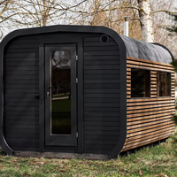 Runde Mobile Sauna-Kabine |   Verkohlte Holzverkleidung, Asphaltschindeldach & Holzofen-Schornstein |   Für 4-6 Personen geeignet