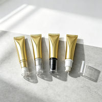 Tube cosmétique brillant doré avec bouchon à vis, impression sérigraphique, contenant vide compressible pour baume à lèvres, kit de voyage