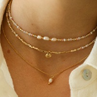 Collier empilable chic style bohème en acier inoxydable avec perles baroques d'eau douce et coquillages pour femme
