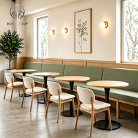 Ensemble de meubles de restaurant Ron Group, table ronde en bois avec base en métal, chaise en tissu, banquette rembourrée confortable