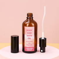 Flacon cosmétique transparent ambré de 100 ml à épaule ronde avec pompe à lotion/pompe à brume fine et capuchon anti-poussière noir
