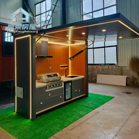 Unit Hunian Modular Tahan Segala Cuaca yang Dirancang Sebagai Rumah Kontainer Lipat dengan Dapur Luar Ruangan untuk Aktivitas Sosial di Halaman Belakang