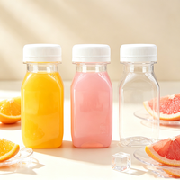 Bouteille vide carrée en plastique PET transparente de 100 ml (3,4 oz) pour café infusé à froid ou jus d'orange, avec bouchons blancs transparents
