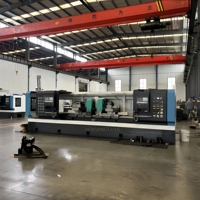 Tour CNC 5 axes à double broche centrale de haute sécurité pour le traitement des pièces métalliques (perceuses/tubes/arbres)