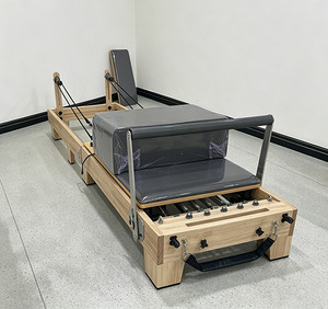 Fournisseur fiable de Reformers de Pilates pliables et écologiques avec cadre en chêne pour une utilisation durable à domicile - Product Image 1
