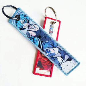 Porte-clés personnalisés en tissu tissé et brodé, vente en gros à prix abordable - Product Image 4