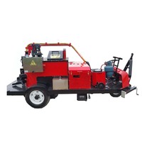 Machine de scellement de boue de réparation de nids de poule d'asphalte