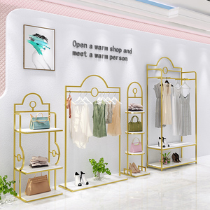 Vente en gros d'étagères modernes en acier inoxydable pour magasin de vêtements <span class=keywords><strong>Boutique</strong></span> présentoirs à vêtements de style européen pour magasin de détail - Product Image 2