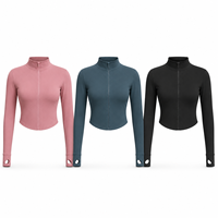 Veste athlétique ajustée pour femme, zippée intégralement ou à quart de zip, extensible, avec passe-pouces, idéale pour la course et l'entraînement (vente en gros)