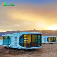 Cabine mobile préfabriquée moderne en forme de capsule spatiale, entièrement équipée et transportable, pour camping, hôtel, zone touristique, chalet de vacances