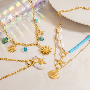 Collier superposé en alliage de zinc couleur or avec pendentif étoile coquillage, chaîne de clavicule double couche, bijou accessoire de mode - Product Image 1