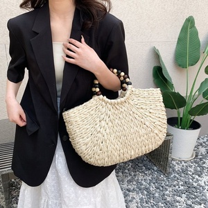 Bolso Bandolera <span class=keywords><strong>de</strong></span> Paja Trenzada Semirredonda Hecho a Mano Huayi 2026 al <span class=keywords><strong>por</strong></span> <span class=keywords><strong>Mayor</strong></span>, Bolso <span class=keywords><strong>de</strong></span> Mano con Asa <span class=keywords><strong>de</strong></span> Cuentas <span class=keywords><strong>de</strong></span> <span class=keywords><strong>Madera</strong></span> para Mujer, Ideal para Verano y Playa - Product Image 4