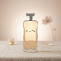 Flacon de parfum rectangulaire de luxe en verre transparent de 100 ml, flacon pulvérisateur de parfum vide avec bouchon carré argenté, logo personnalisé