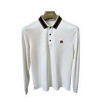 Polo de luxe pour homme à manches longues en coton piqué premium avec col rayé contrastant, broderie tendance, hauts décontractés OEM/ODM