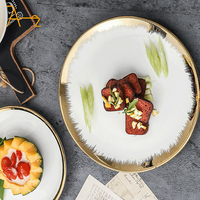 Vaisselle en céramique ronde en porcelaine avec bord doré, personnalisée par l'usine OEM, pour servir la pizza, assiette plate pour le dîner, pour mariage, hôtel