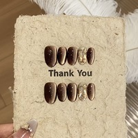 Vente en gros d'ongles de créateur Ongles courts en acrylique cercueil Ongles vert clair à couverture complète avec strass Ongles à pression faits à la main