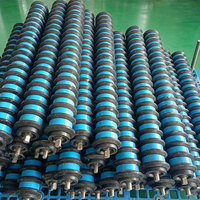 Roller Spiral UHMWPE Anti-korosi Tahan Api Tahan Panas 89mm Plastik Idler untuk Konveyor Pelabuhan