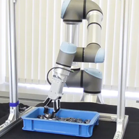 Bras robotisé de manutention industrielle automatique UR 16e Charge utile 16kg Robot collaboratif utilisé pour la palettisation et la distribution