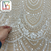 Tissu de robe de mariée africaine haut de gamme en dentelle perlée blanche française avec des paillettes