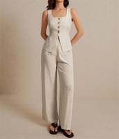 Ensemble 2 pièces Nouveau Chemise sans manches irrégulière à revers large et pantalon taille haute à jambes larges Deux pièces