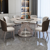 Ensemble de table à manger ronde en pierre frittée de luxe moderne avec 6 chaises en cuir, cadre en or rose, meubles pour la maison et les restaurants