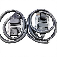 Sensores de Oxígeno Delanteros y Traseros para Excavadoras Volvo China IV. Sensor Delantero (Blanco): 22827992; Sensor Trasero (Negro): 22827993.