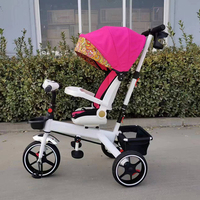 Vente en gros en ligne tricycle bébé 4 en 1 avec barre de poussée tricycle bébé avec auvent voiture à roulettes avec prix bas