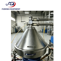 Centrifugeuse séparatrice à disques d'occasion à haute efficacité pour la séparation fine solide-liquide et le processus de clarification de l'huile
