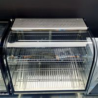 Vitrine de boulangerie multifonctionnelle à une clé facile à utiliser Affichage électrique d'aliments chauds en bois de verre en acier inoxydable à vendre