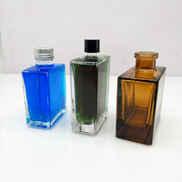 Großhandel 150ml 200ml Quadratische Bernsteinfarbene Klare Blau Verlaufende Parfümflaschen mit Silbernem Sprühkopf und Schwarzem Schraubverschluss für Parfüm-Neuverpackung