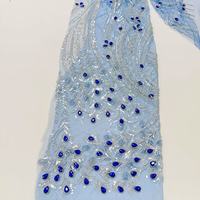 Tissu en dentelle brodée de plumes de paon à sequins argentés, bleu roi, avec perles en forme de goutte, pour robe, vente en gros personnalisée