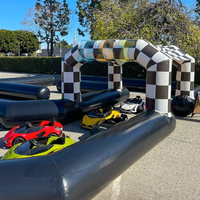 Piste de course gonflable de kart pour l'extérieur avec logo personnalisé piste de course pour voiture pare-chocs gonflable piste de course noire étanche à l'air
