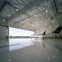 Hangar d'avion préfabriqué en structure métallique à grande portée 70x80m, à assemblage rapide, pour le stationnement et le stockage d'avions de grande taille