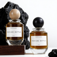 Flacon de parfum en verre transparent cylindrique de luxe personnalisé de haute qualité, vide, avec pulvérisateur à sertir, 100 ml, avec impression d'écran et diffuseur à roseaux