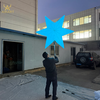 Marionnette gonflable lumineuse en forme d'étoile pour les activités commerciales, les fêtes, les défilés