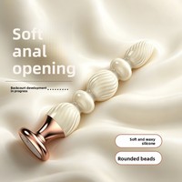 Plug anal en silicone blanc sûr avec base dorée et design à billes, modèle AS-025