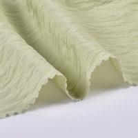 Tissu pour vêtements féminins en rayonne viscose mat haute densité, ondulé, jacquard tricoté, respirant, printemps-été, de marque tendance et de haute qualité
