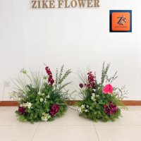 Ensemble floral artificiel bordeaux haut de gamme fait main pour la décoration de toile de fond de mariage de luxe