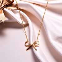 Collier nœud papillon en acier inoxydable 316L plaqué or 18 carats, design minimaliste, idée cadeau parfaite pour les femmes et les filles