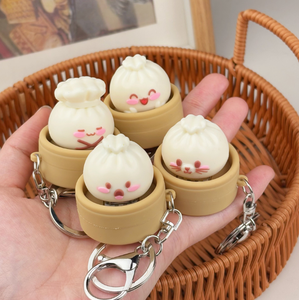 Vente en gros usine : Porte-clés mini dumpling vapeur en PVC souple, pendentif de sac, jouet de décompression mignon pour enfants et adultes - Product Image 6