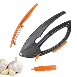Gadget dapur Manual baja tahan karat penghancur bawang putih dengan pengupas buah