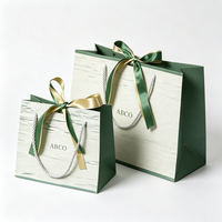 Sacs en papier kraft écologiques personnalisés avec logo imprimé pour bijoux et artisanat, vente en gros avec poignées en ruban