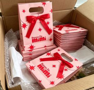 ถุงของขวัญกระดาษพิมพ์โลโก้แบรนด์ตามสั่งจากโรงงาน ถุงช้อปปิ้งสำหรับเสื้อผ้าหรูหราสำหรับโปรโมชั่น - Product Image 2