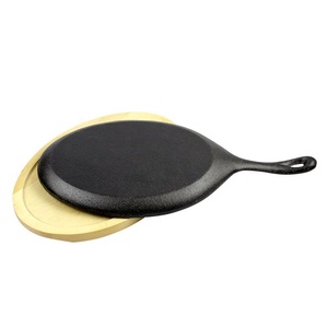 <span class=keywords><strong>Plaque</strong></span> ovale <span class=keywords><strong>en</strong></span> <span class=keywords><strong>fonte</strong></span> avec base <span class=keywords><strong>en</strong></span> bois <span class=keywords><strong>pour</strong></span> cuisson de steak de <span class=keywords><strong>barbecue</strong></span> casseroles à rôtir chaudes <span class=keywords><strong>en</strong></span> métal - Product Image 2