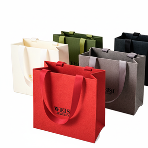 Bolsas de papel Kraft sostenible de nuevo diseño directo de fábrica de China con asa reforzada para Navidad y Año Nuevo - Product Image 1