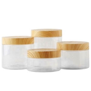 New Design Empty 200ml 300ml 400ml 500ml 800ml 1000ml Bamboo Wood Lid Round Frosted <b>Plastic</b> Pet <b>Jars</b> - Product Image 1