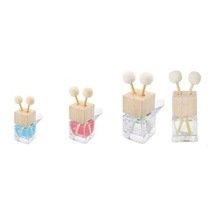 Set di diffusori in legno con oli essenziali, mini deodorante per auto con flacone cubico per uso domestico e in auto - Product Image 1